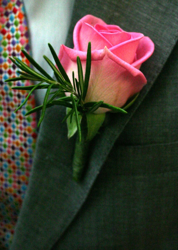 Rose and rosemary buttonholes for the gents 